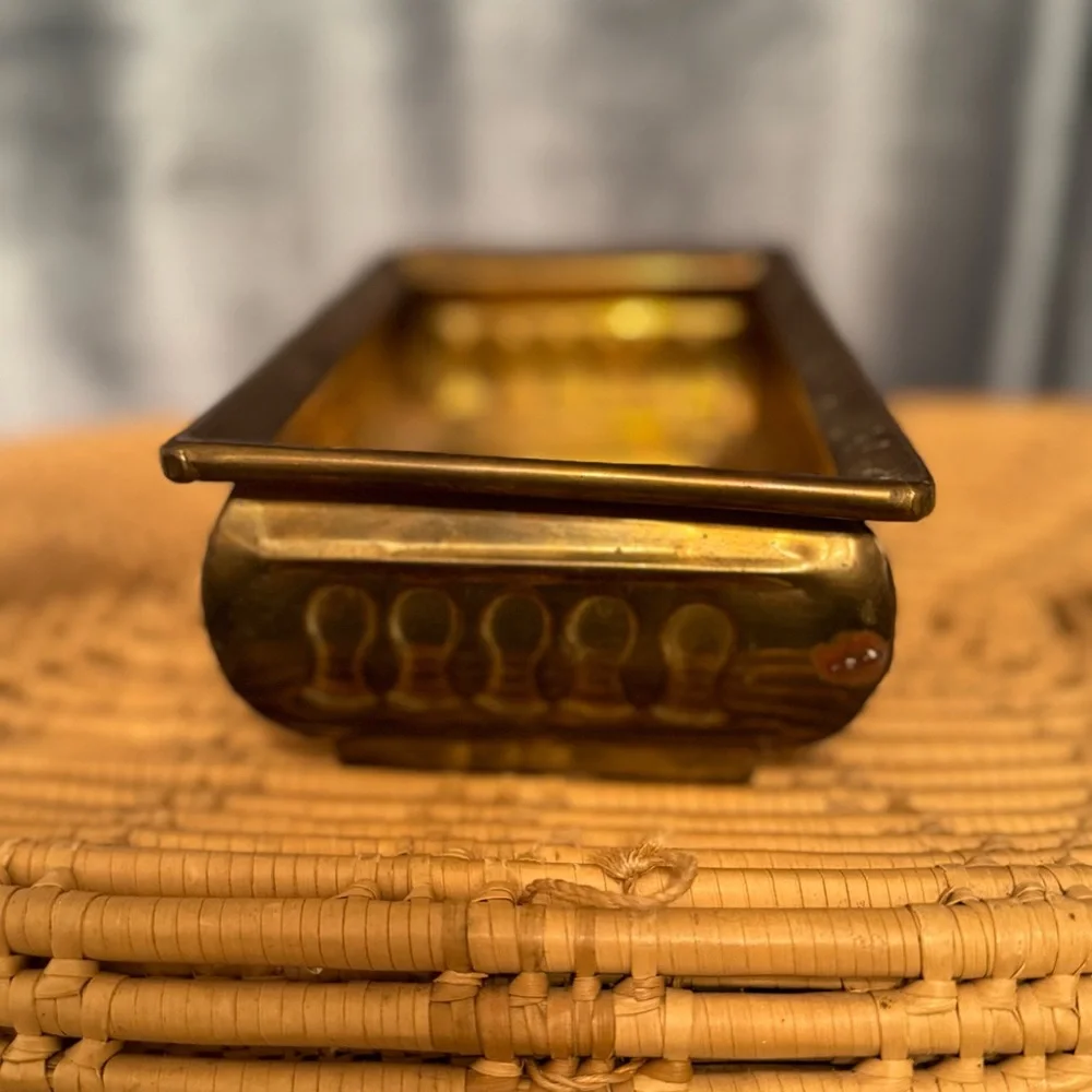 vintage brass planter, also known as a jardinière or cachepot.